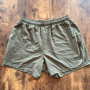Green Gymshark ARRIVAL 5" SHORTS size medium